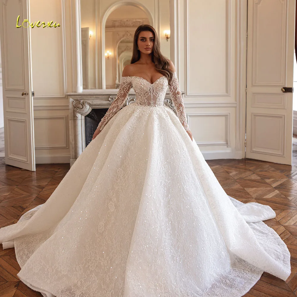 Изысканное свадебное платье Loverxu А-силуэта с открытыми плечами, кружевной вышивкой и блестящими пайетками, на заказ
Изысканное свадебное платье Loverxu А-силуэта с открытыми плечами, кружевной вышивкой и блестящими пайетками, на заказ