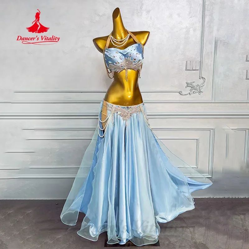 Женский костюм для танца живота BellyDance, роскошный костюм из двух предметов: бюстгальтер и высококачественная атласная длинная юбка, профессиональный костюм для выступлений
Женский костюм для танца живота BellyDance, роскошный костюм из двух предметов: бюстгальтер и высококачественная атласная длинная юбка, профессиональный костюм для выступлений