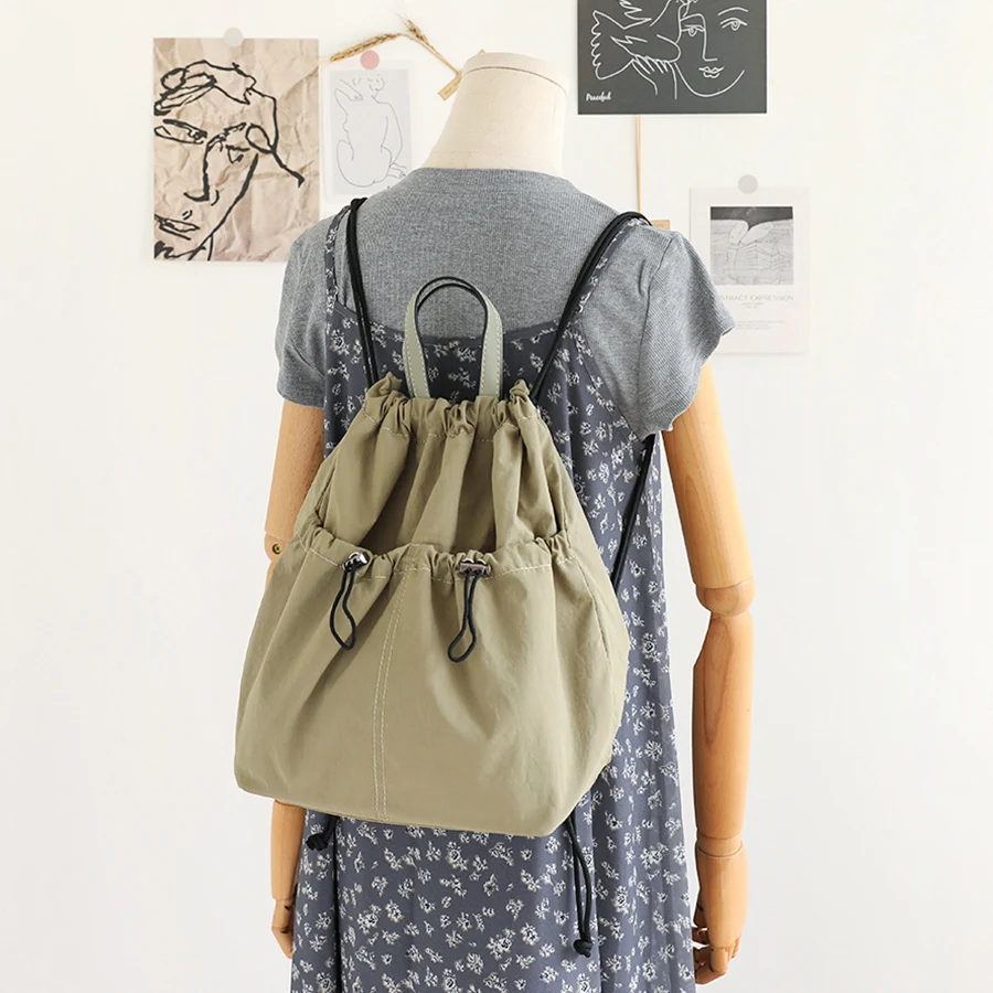 Korean casual drawstring bucket bag female nylon cloth backpack simple portable travel bagpack solid bookbag mochila Rucksack
Korean casual drawstring bucket bag female nylon cloth backpack simple portable travel bagpack solid bookbag mochila Rucksack