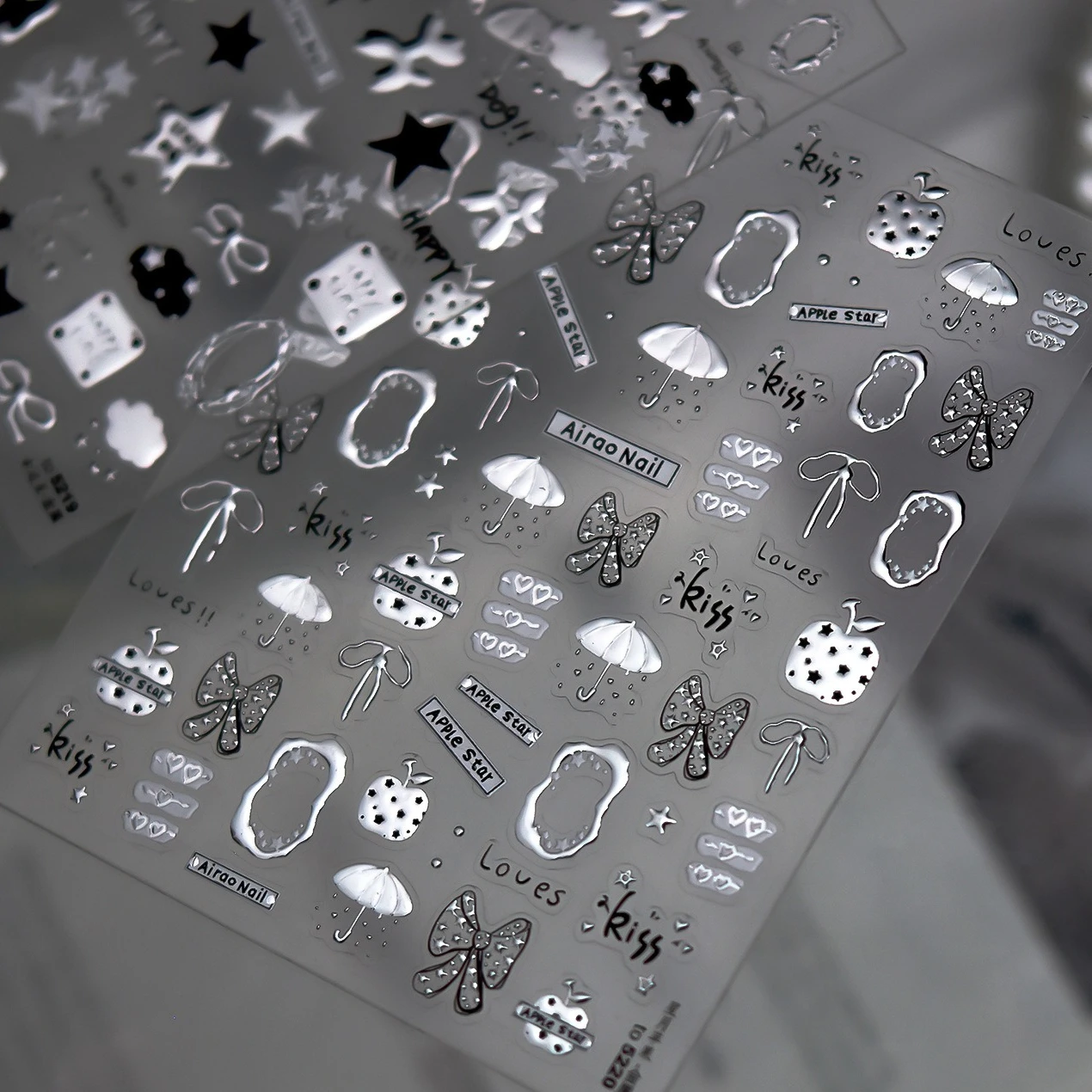 Silver Metal Star Apple Dog Bowknot Ribbon Cloud Love Heart Umbrella Punk Geometric Rock Clock Moon Y2K Nail Art Stickers Decals
Silver Metal Star Apple Dog Bowknot Ribbon Cloud Love Heart Umbrella Punk Geometric Rock Clock Moon Y2K Nail Art Stickers Decals