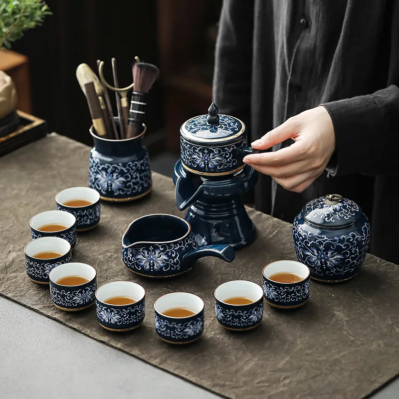 Enamel-Colored Lazy Person's Automatic Tea Set for Home and Office Use, Complete Ceramic Kung Fu Tea Maker with Gold-Painted Floral Designs
Enamel-Colored Lazy Person's Automatic Tea Set for Home and Office Use, Complete Ceramic Kung Fu Tea Maker with Gold-Painted Floral Designs