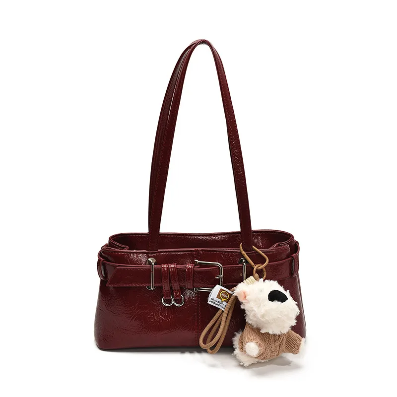 Luxury Belt Strap Design Underarm Shoulder Bag With Cute Doll Keychain For Women Elegant PU Leather Handbag For Daily Use
Luxury Belt Strap Design Underarm Shoulder Bag With Cute Doll Keychain For Women Elegant PU Leather Handbag For Daily Use