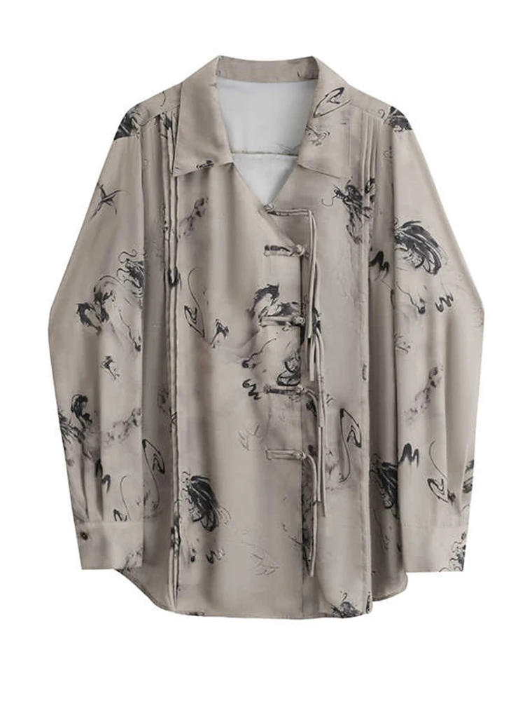 Spring and Autumn New Chinese Style National Style Su Pan Button Dragon Pattern V-neck Top Ink Painting Loose Shirt for Women
Spring and Autumn New Chinese Style National Style Su Pan Button Dragon Pattern V-neck Top Ink Painting Loose Shirt for Women