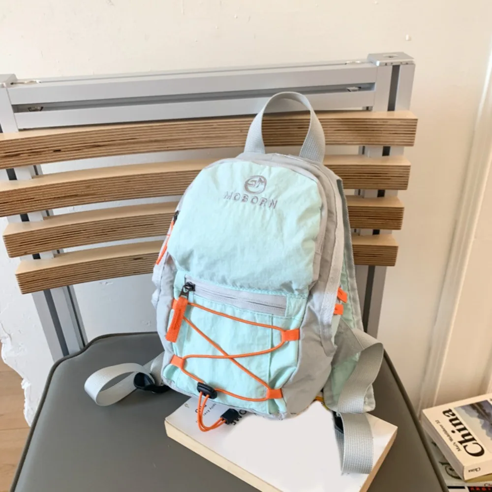 Korean Style Outdoor Drawstring Backpack Solid Color Waterproof Travel Nylon Backpack Commute Large Capacity Hiking Shoulder Bag
Korean Style Outdoor Drawstring Backpack Solid Color Waterproof Travel Nylon Backpack Commute Large Capacity Hiking Shoulder Bag