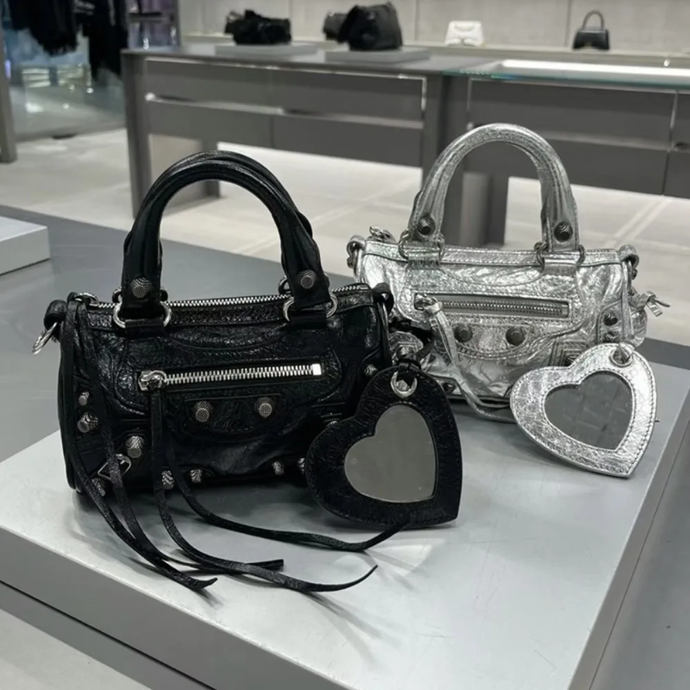 New Mini Cylindrical Locomotive Women's Rivets Tassel Three-in-one Pleated Cowhide Shoulder Crossbody Portable Women's Bag
New Mini Cylindrical Locomotive Women's Rivets Tassel Three-in-one Pleated Cowhide Shoulder Crossbody Portable Women's Bag