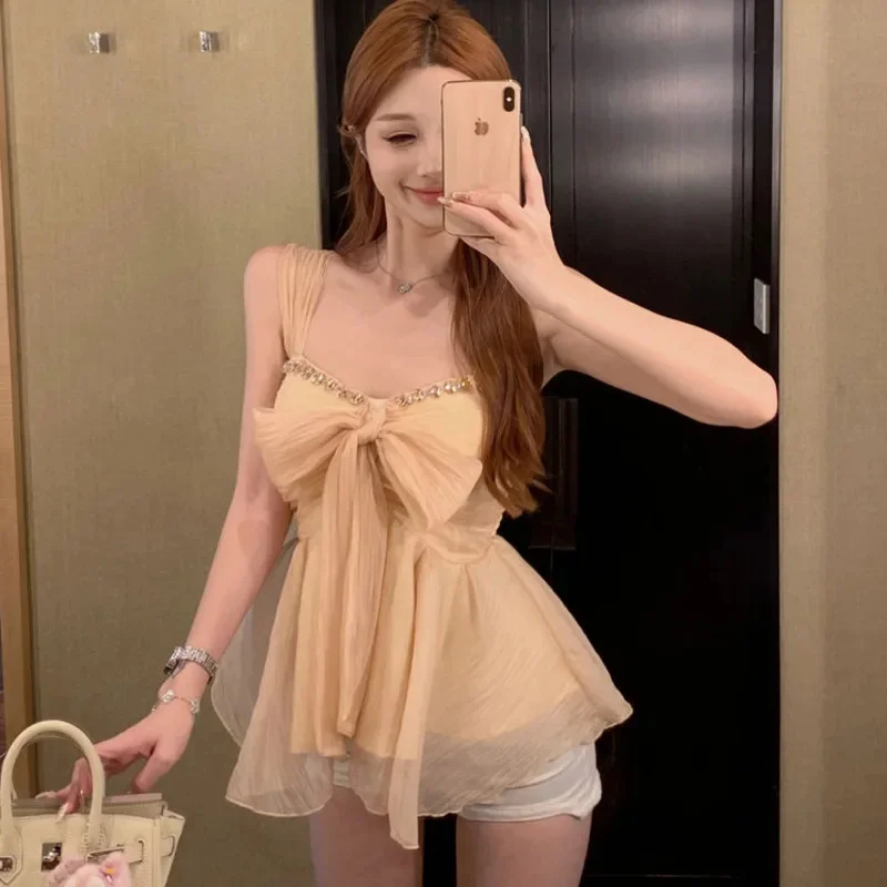 Summer Diamond Studded Vest Women Sweet Bow Tie Sleeveless Backless Slim Sexy Blouse 2025 New Fashion Lady Street Tank Tops
Summer Diamond Studded Vest Women Sweet Bow Tie Sleeveless Backless Slim Sexy Blouse 2025 New Fashion Lady Street Tank Tops