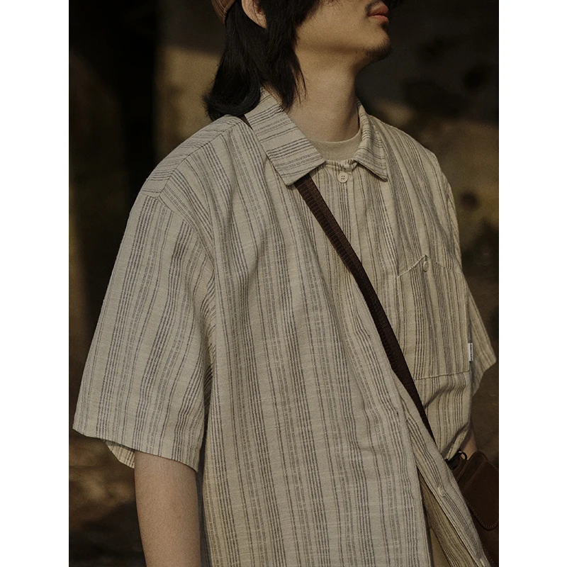Summer Men's Striped Shirt Casual Loose Fit Short Sleeve Artistic Youth Style Japanese Retro Trendy Clothing Fashionable Butt...
Summer Men's Striped Shirt Casual Loose Fit Short Sleeve Artistic Youth Style Japanese Retro Trendy Clothing Fashionable Butt...