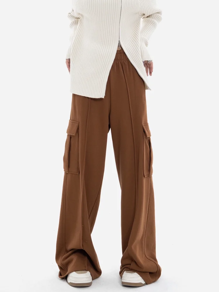 Свободные женские повседневные брюки с эластичным поясом, широкими штанинами и длинными штанинами в пол, с большими карманами, из комфортной трикотажной ткани
Свободные женские повседневные брюки с эластичным поясом, широкими штанинами и длинными штанинами в пол, с большими карманами, из комфортной трикотажной ткани