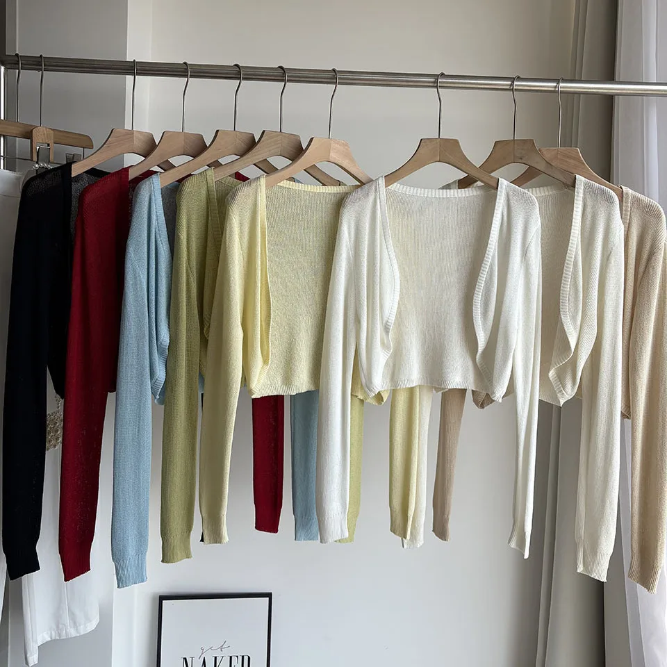 Linen Knitted Open Cardigan Women's Short Top Shoulder Pad with Sling Skirt Thin Outer Long Sleeve Sun Protection Summer Shawl
Linen Knitted Open Cardigan Women's Short Top Shoulder Pad with Sling Skirt Thin Outer Long Sleeve Sun Protection Summer Shawl