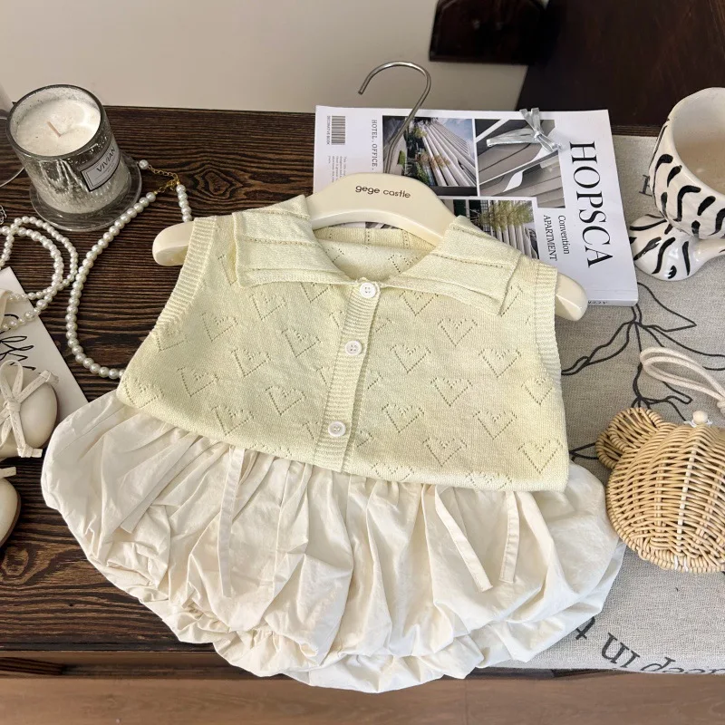 Korean Version of Children's Clothing 2025 New Summer Girls Doll Collar Knitted Vest Bow Bud Shorts Two-piece Set
Korean Version of Children's Clothing 2025 New Summer Girls Doll Collar Knitted Vest Bow Bud Shorts Two-piece Set