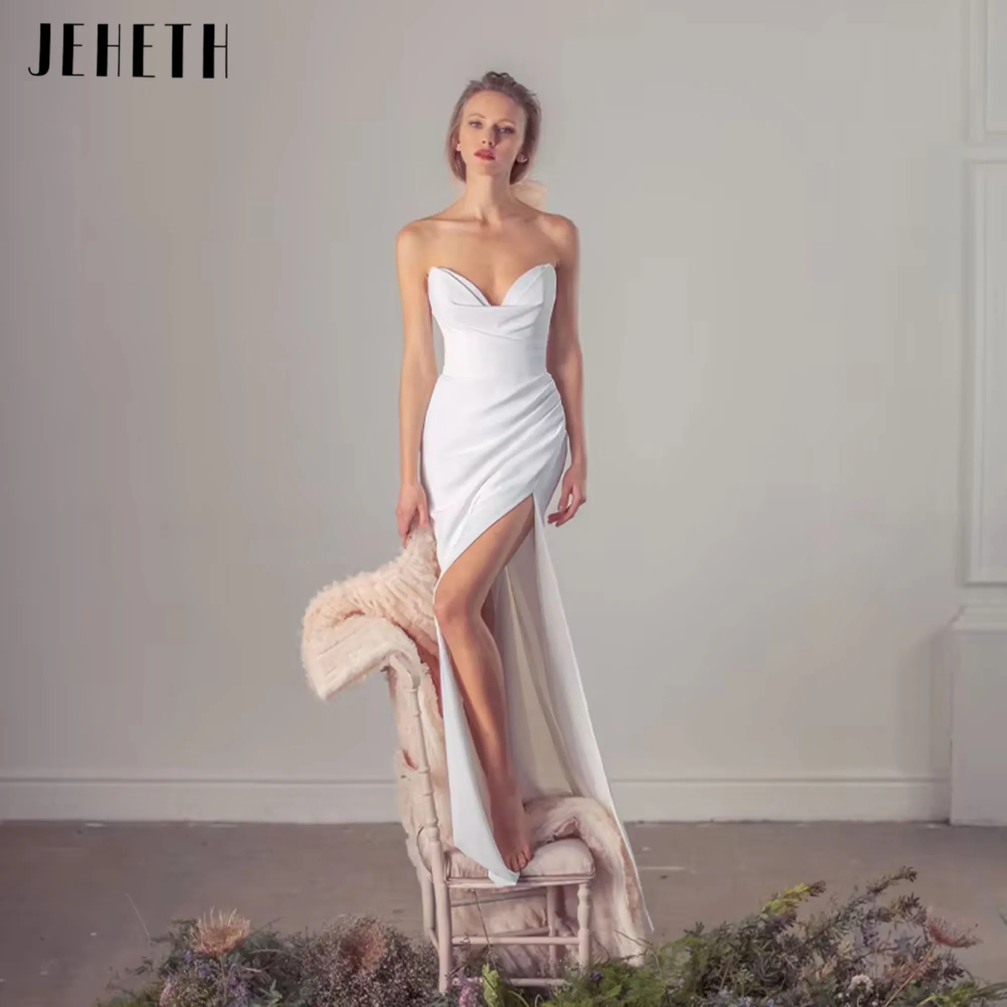 JEHETH Popular V-neck Satin Sheath 2025 Wedding Dresses Side Slit Button Back Boho Beach Bridal Grown Robe de Mariage Customized
JEHETH Popular V-neck Satin Sheath 2025 Wedding Dresses Side Slit Button Back Boho Beach Bridal Grown Robe de Mariage Customized