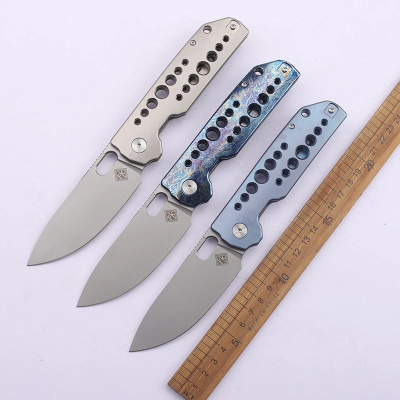 High Hardness VG10 Steel Sheet Titanium Alloy Handle Folding Knife Portable Outdoor Camping Hiking Survival Tool
High Hardness VG10 Steel Sheet Titanium Alloy Handle Folding Knife Portable Outdoor Camping Hiking Survival Tool