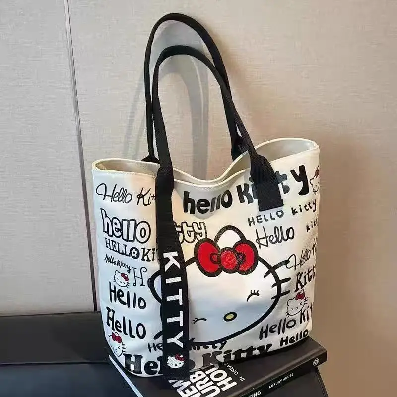 Sanrio японская холщовая сумка с героями мультфильмов «Hello Kitty», новая повседневная сумка на одно плечо Kawaii, большая вместительная студенческая уличная сумка-тоут
Sanrio японская холщовая сумка с героями мультфильмов «Hello Kitty», новая повседневная сумка на одно плечо Kawaii, большая вместительная студенческая уличная сумка-тоут
