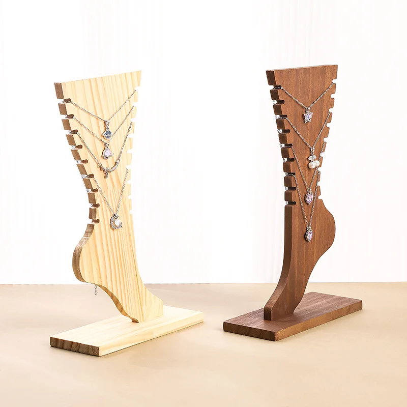 Wooden Foot Shaped Necklace Display Stand Creative Ornaments Jewelry Display Props Display Rack for Boutique & Home Decor
Wooden Foot Shaped Necklace Display Stand Creative Ornaments Jewelry Display Props Display Rack for Boutique & Home Decor