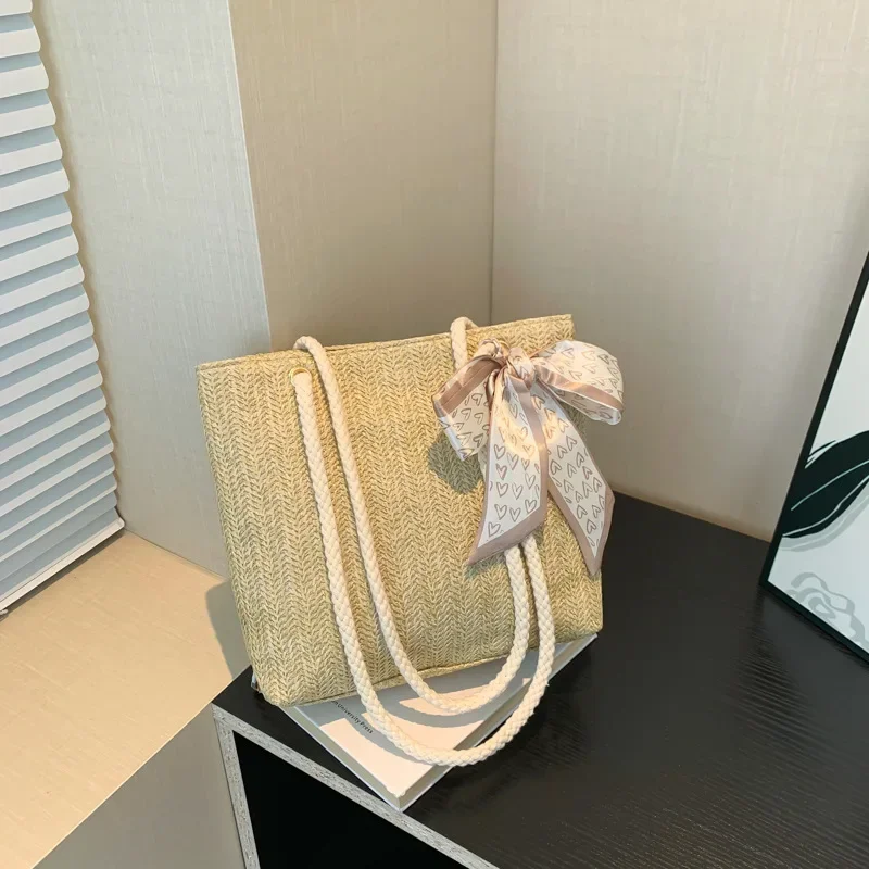 Premium sense large capacity straw shoulder bag commuter silk scarf bow hand carry tote bag
Premium sense large capacity straw shoulder bag commuter silk scarf bow hand carry tote bag