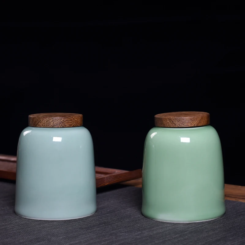 Большой чайник Celadon, креативный бытовой керамический черный чай, зеленый чай, Универсальный Высококачественный деревянный контейнер для хранения чая с герметичной крышкой
Большой чайник Celadon, креативный бытовой керамический черный чай, зеленый чай, Универсальный Высококачественный деревянный контейнер для хранения чая с герметичной крышкой
