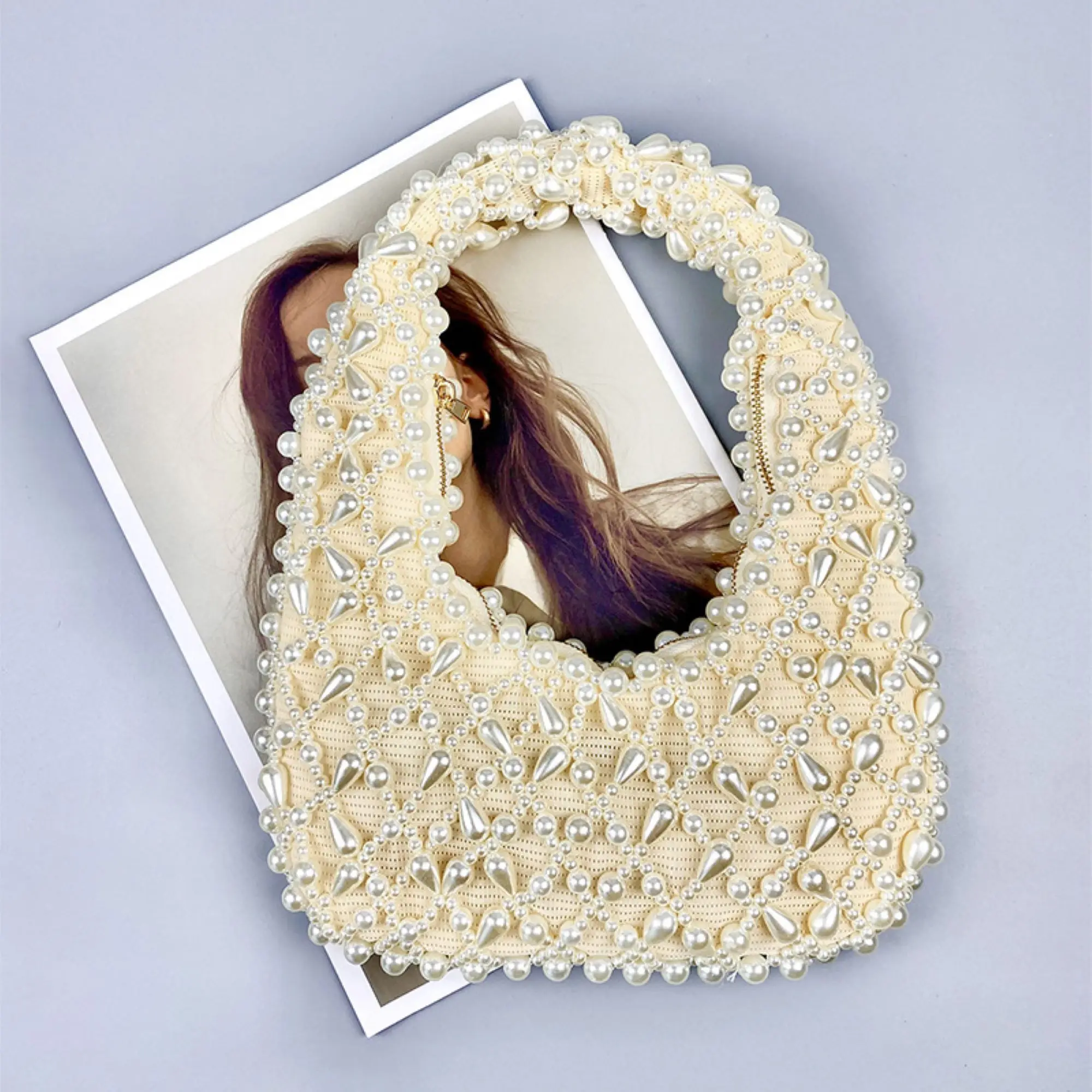 New minimalist and trendy women's pearl rhinestone high-quality handmade beaded woven bag
New minimalist and trendy women's pearl rhinestone high-quality handmade beaded woven bag