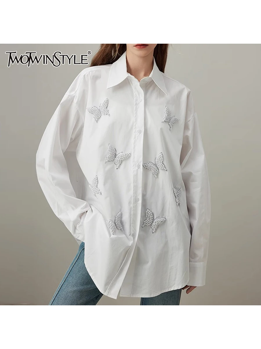 TWOTWINSTYLE однотонные свободные блузки с жемчугом для женщин, лоскутные рубашки на пуговицах с длинными рукавами и лацканами, женская модная стильная одежда
TWOTWINSTYLE однотонные свободные блузки с жемчугом для женщин, лоскутные рубашки на пуговицах с длинными рукавами и лацканами, женская модная стильная одежда