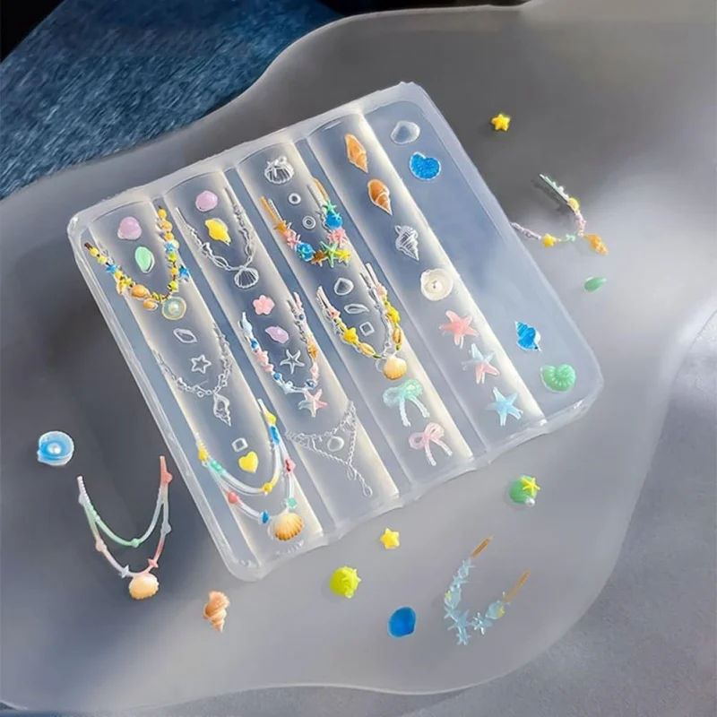 Формы для дизайна ногтей в виде ракушки, силиконовый инструмент, ракушка, морская звезда, цепочки, дизайн, мультяшные аксессуары для ногтей, изготовление украшений для маникюра своими руками
Формы для дизайна ногтей в виде ракушки, силиконовый инструмент, ракушка, морская звезда, цепочки, дизайн, мультяшные аксессуары для ногтей, изготовление украшений для маникюра своими руками