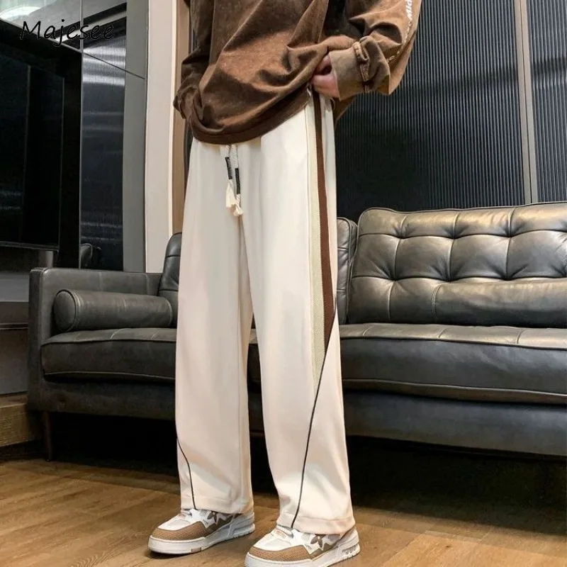 Side Stripe Pants Men Straight Loose Ankle Length Lace-up Elastic Waist Mid Panelled Spring Autumn American Style Spliced
Side Stripe Pants Men Straight Loose Ankle Length Lace-up Elastic Waist Mid Panelled Spring Autumn American Style Spliced