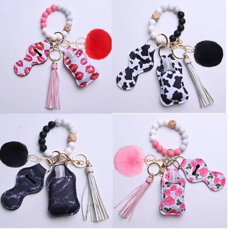 Silicone Keychain with Hand Sanitzer Holder Tassel Wood Beads Bracelet Keyring for Women Wristlet Key Chain Accessories Cute
Silicone Keychain with Hand Sanitzer Holder Tassel Wood Beads Bracelet Keyring for Women Wristlet Key Chain Accessories Cute