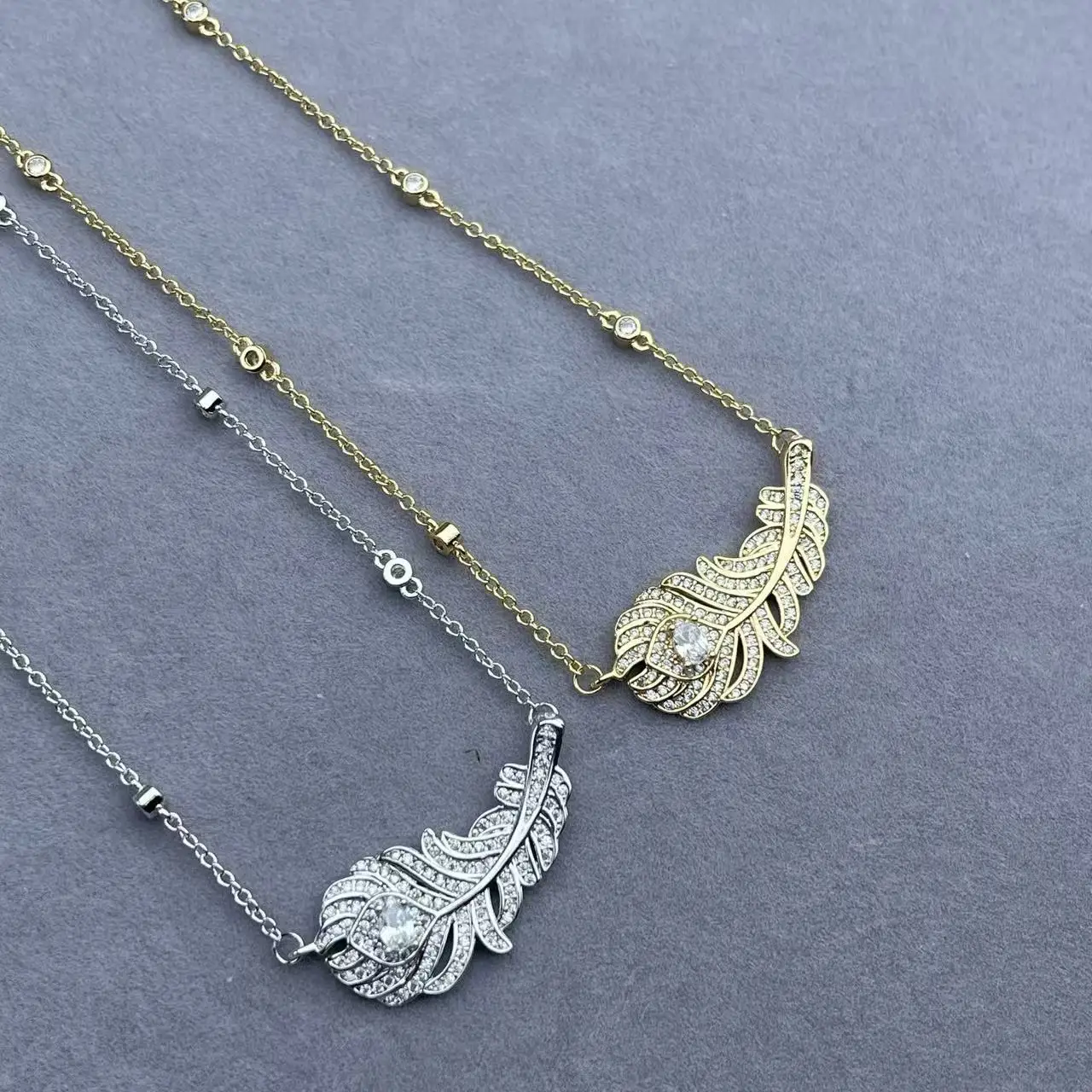 Europe and America Luxury Fashion 925 Silver Gold-Plated Women's all Diamond Feather Ring Necklace Elegant Jewelry Accessories
Europe and America Luxury Fashion 925 Silver Gold-Plated Women's all Diamond Feather Ring Necklace Elegant Jewelry Accessories