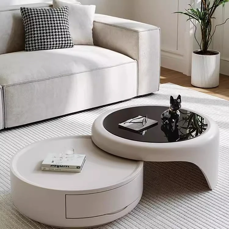 Pudding cream wind coffee table living room combination tempered glass creative designer high sense round
Pudding cream wind coffee table living room combination tempered glass creative designer high sense round
