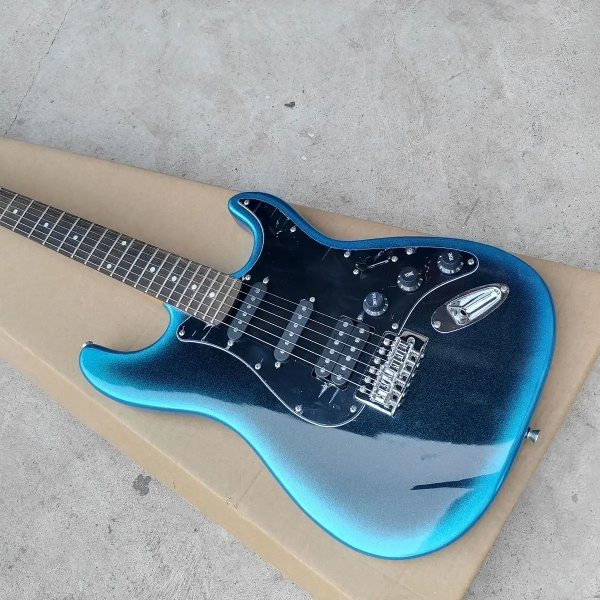 High end customized dark blue electric guitar for professional performance with 6 strings
High end customized dark blue electric guitar for professional performance with 6 strings