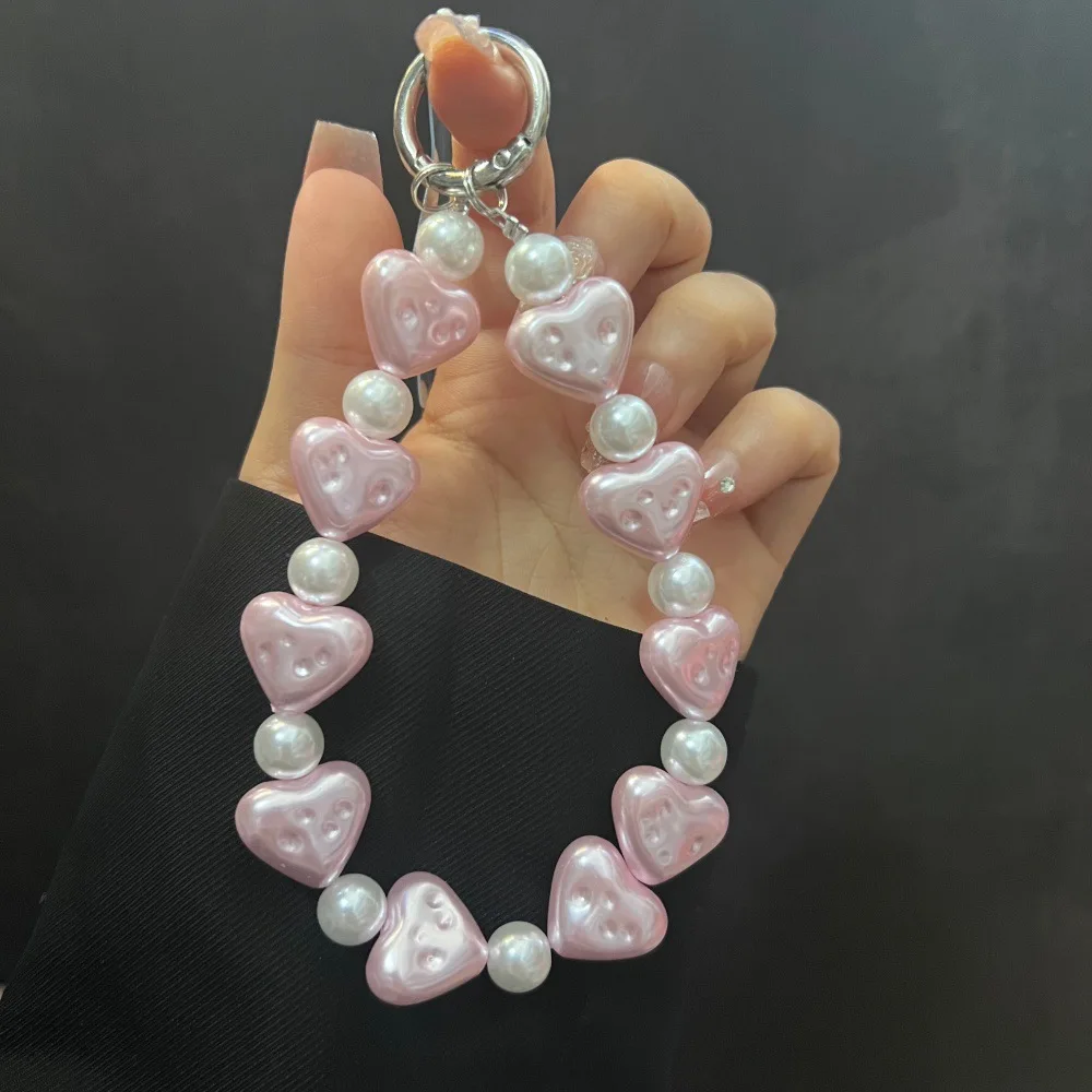 Personalized Creative Love Plastic Pearl Beads Handheld Chain Wrist Short Hanging Rope with Clip Phone Case Car Key Bag Pendant
Personalized Creative Love Plastic Pearl Beads Handheld Chain Wrist Short Hanging Rope with Clip Phone Case Car Key Bag Pendant
