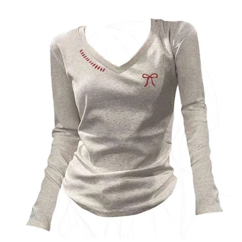 Женская одежда, корейские универсальные молодежные топы с бантом и принтом, весна-осень, новые футболки с длинным рукавом и v-образным вырезом, тонкие трендовые футболки, повседневная мода
Женская одежда, корейские универсальные молодежные топы с бантом и принтом, весна-осень, новые футболки с длинным рукавом и v-образным вырезом, тонкие трендовые футболки, повседневная мода