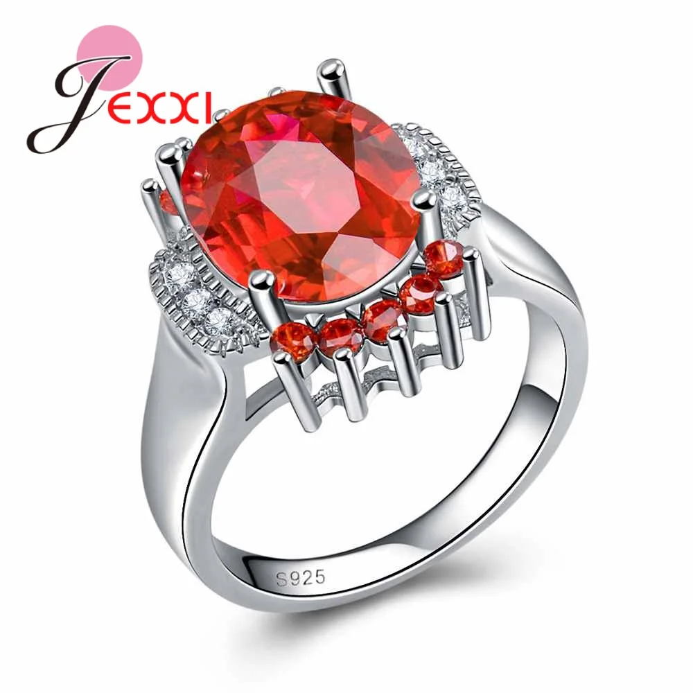 925 Sterling Silver Color Elegant Red Oval Stone Ring with Paved Created Bridal Jewelry for Women Party and Wedding Accessory
925 Sterling Silver Color Elegant Red Oval Stone Ring with Paved Created Bridal Jewelry for Women Party and Wedding Accessory