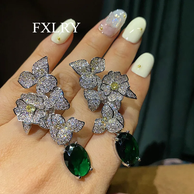 FXLRY Luxury Cubic Zirconia Fashion White Color Flower and Green Waterdrop Earring for Women Wedding Jewelry
FXLRY Luxury Cubic Zirconia Fashion White Color Flower and Green Waterdrop Earring for Women Wedding Jewelry
