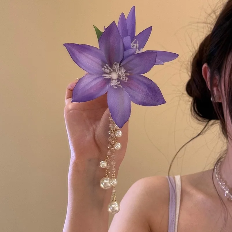 Simulation super fairy purple clematis flower hairpin female pure desire temperament pearl fringed hair accessories
Simulation super fairy purple clematis flower hairpin female pure desire temperament pearl fringed hair accessories