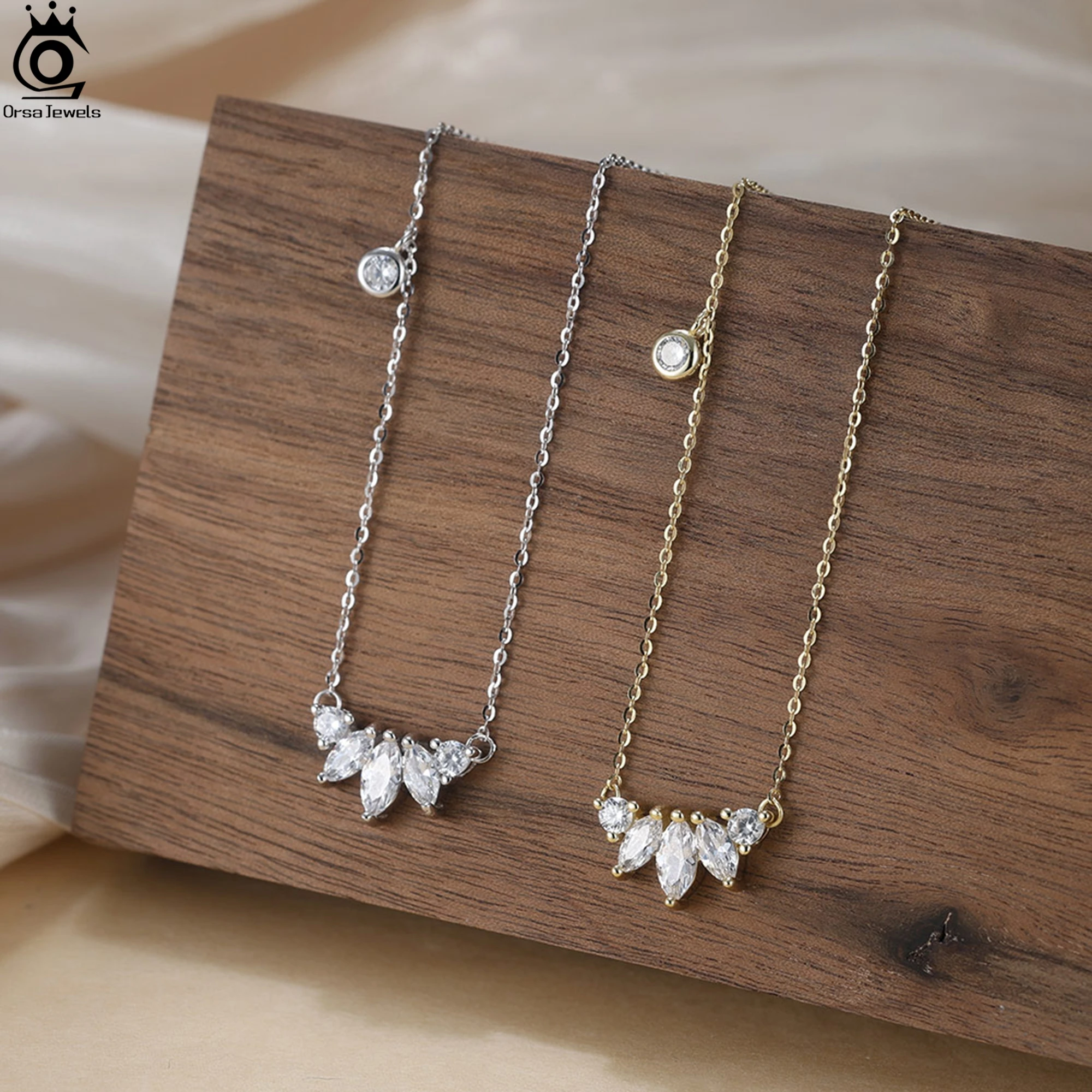 ORSA JEWELS настоящее ожерелье из стерлингового серебра 925 пробы с сверкающим бирюзовым цирконием AAAA, орнаментом, уплотнительной цепочкой, подарок APN45
ORSA JEWELS настоящее ожерелье из стерлингового серебра 925 пробы с сверкающим бирюзовым цирконием AAAA, орнаментом, уплотнительной цепочкой, подарок APN45