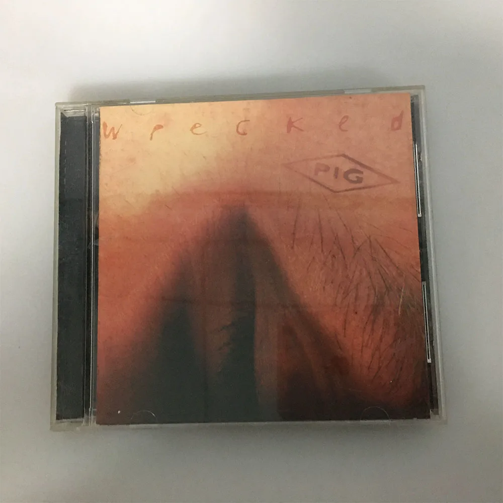 CD This Is The Fifth Studio Album 'Wrecked' By British Industrial Rock Musician Raymond Watts (known By The Stage Name PIG).
CD This Is The Fifth Studio Album 'Wrecked' By British Industrial Rock Musician Raymond Watts (known By The Stage Name PIG).
