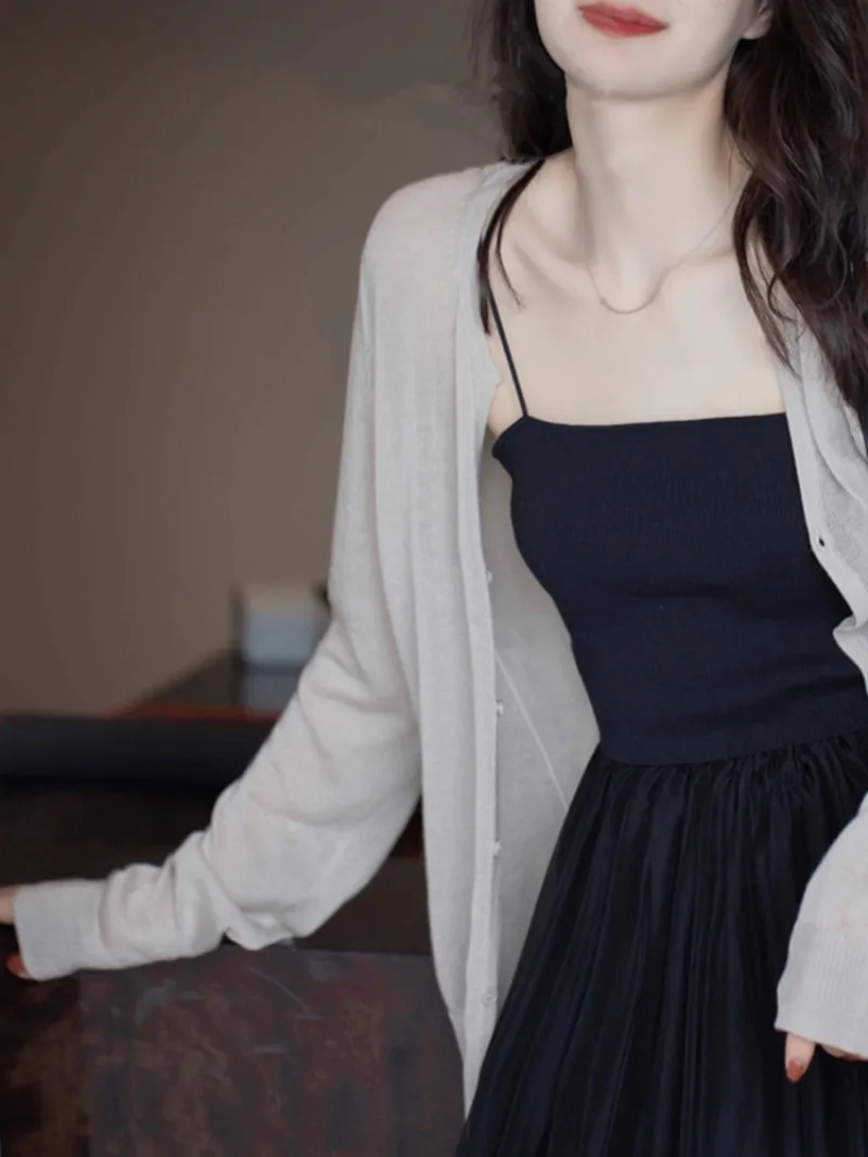 Summer Ice Silk Thin Knitted Cardigan Women's Air Conditioner Shirt Outerwear Shoulder Padded V-Neck Long Sleeve Slim Fit Top
Summer Ice Silk Thin Knitted Cardigan Women's Air Conditioner Shirt Outerwear Shoulder Padded V-Neck Long Sleeve Slim Fit Top