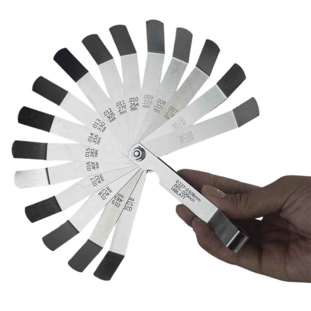 Измерительный инструмент с 16 лезвиями для метрических и дюймовых измерений, линейка для проверки сварки, толщиномер для измерения толщины клапанов и размера пазов
Измерительный инструмент с 16 лезвиями для метрических и дюймовых измерений, линейка для проверки сварки, толщиномер для измерения толщины клапанов и размера пазов