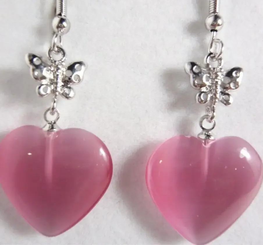 Women's fashion temperament metal plated silver pink cat's Eye Stone Heart Earrings
Women's fashion temperament metal plated silver pink cat's Eye Stone Heart Earrings