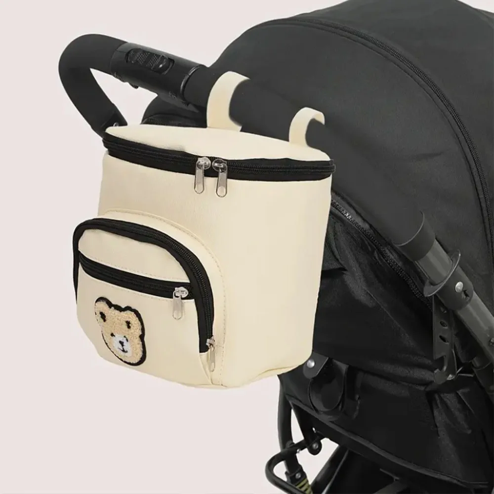 Подвесная сумка для коляски с милым медвежьим узором, многофункциональный органайзер для коляски для хранения подгузников, дорожный органайзер для мамы
Подвесная сумка для коляски с милым медвежьим узором, многофункциональный органайзер для коляски для хранения подгузников, дорожный органайзер для мамы