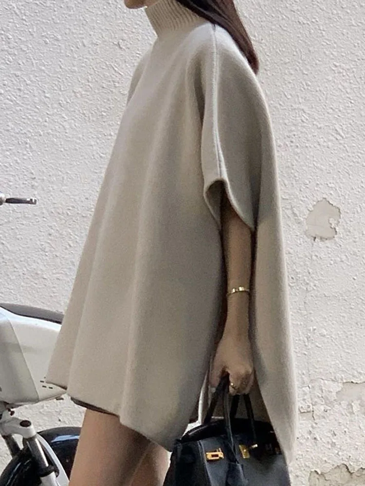 2023 Autumn Winter High Neck Loose Casual Short Sleeve Cloak Knitted Sweater Women Oversized Tank Top Coffee shawl X455
2023 Autumn Winter High Neck Loose Casual Short Sleeve Cloak Knitted Sweater Women Oversized Tank Top Coffee shawl X455