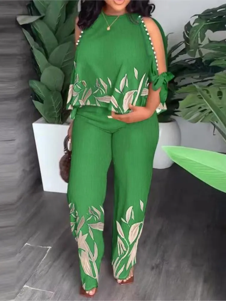 Женский модный комплект из двух предметов с принтом, летний костюм с круглым вырезом, полым бисером, рукавами реглан и широкими брюками
Женский модный комплект из двух предметов с принтом, летний костюм с круглым вырезом, полым бисером, рукавами реглан и широкими брюками