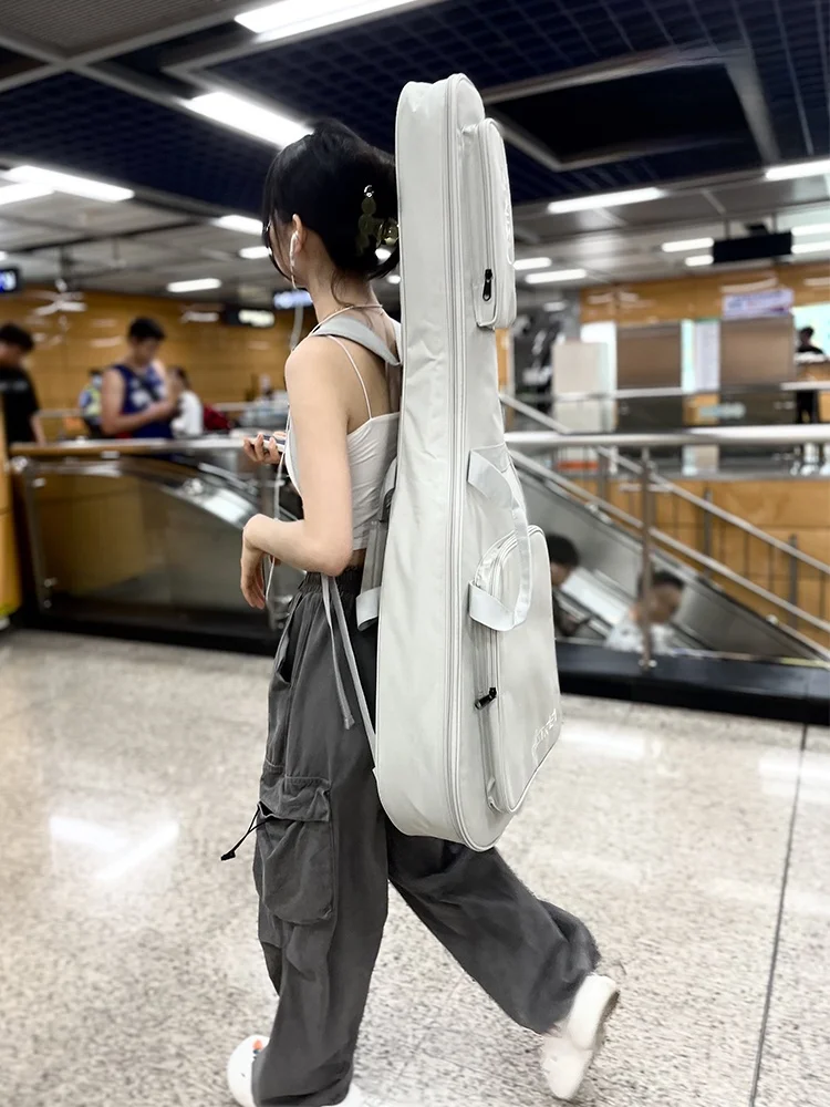 Thiened Guitar Bag 4 Inch Universal Protective Case for 34 Inch Folk Wood Guitar Bapa Musical Instrument Accories
Thiened Guitar Bag 4 Inch Universal Protective Case for 34 Inch Folk Wood Guitar Bapa Musical Instrument Accories