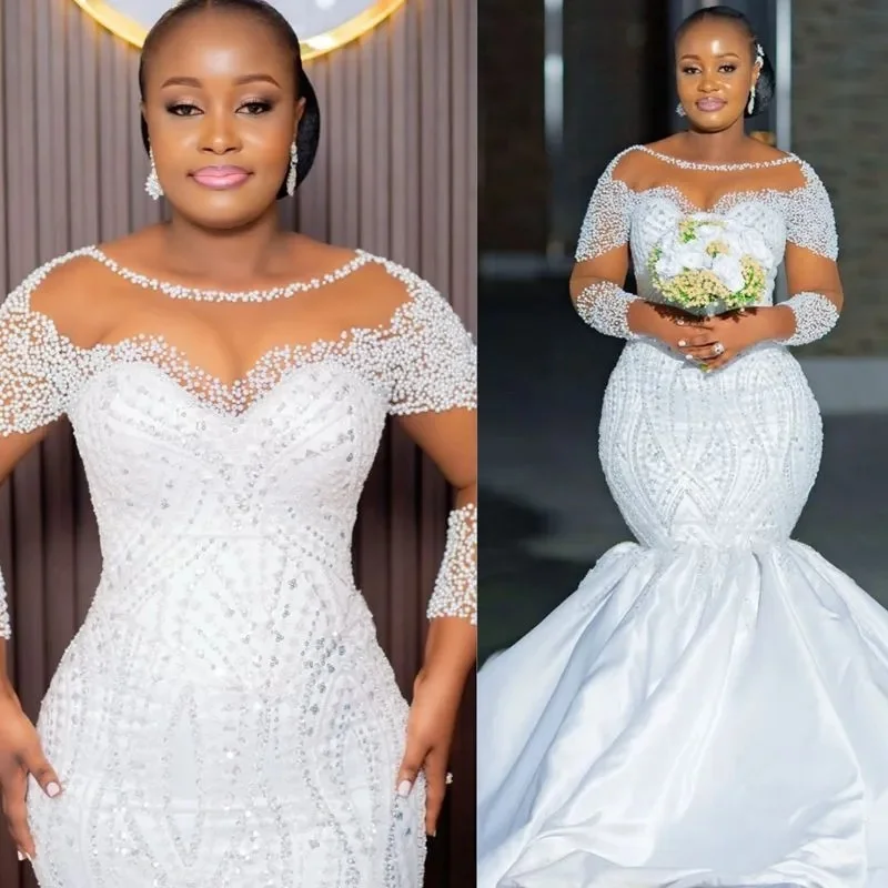 Customized African Wedding Dress Bridal Gowns For Bride Mermaid Wedding Gowns Sheer Illusion Long Sleeves Pearls Beaded Lace
Customized African Wedding Dress Bridal Gowns For Bride Mermaid Wedding Gowns Sheer Illusion Long Sleeves Pearls Beaded Lace