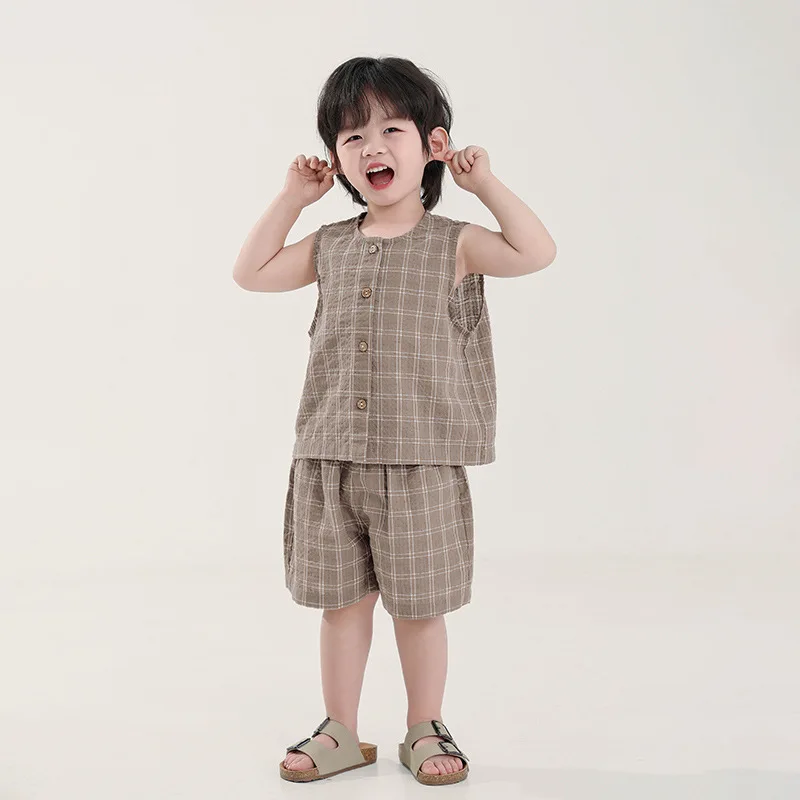 2026 Summer Clothing Children's Thin Style Hot Selling Checkered Round Neck Sleeveless Retro Tank Top and Shorts Two Piece Set
2026 Summer Clothing Children's Thin Style Hot Selling Checkered Round Neck Sleeveless Retro Tank Top and Shorts Two Piece Set