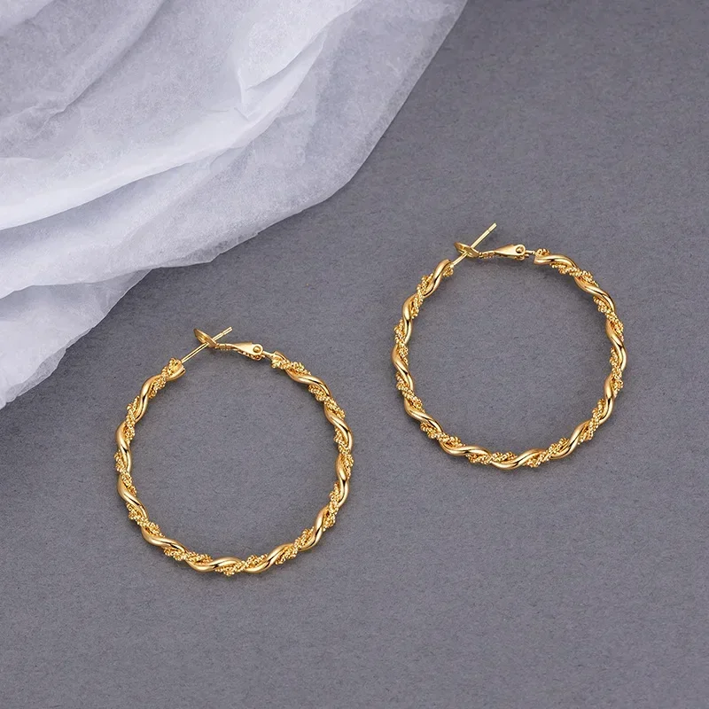 9999 Real Gold 24K Cold Wind Simple Circle Twist Earrings S925 Silver Needle Premium Retro Exaggerated Twist Circle Earrings
9999 Real Gold 24K Cold Wind Simple Circle Twist Earrings S925 Silver Needle Premium Retro Exaggerated Twist Circle Earrings