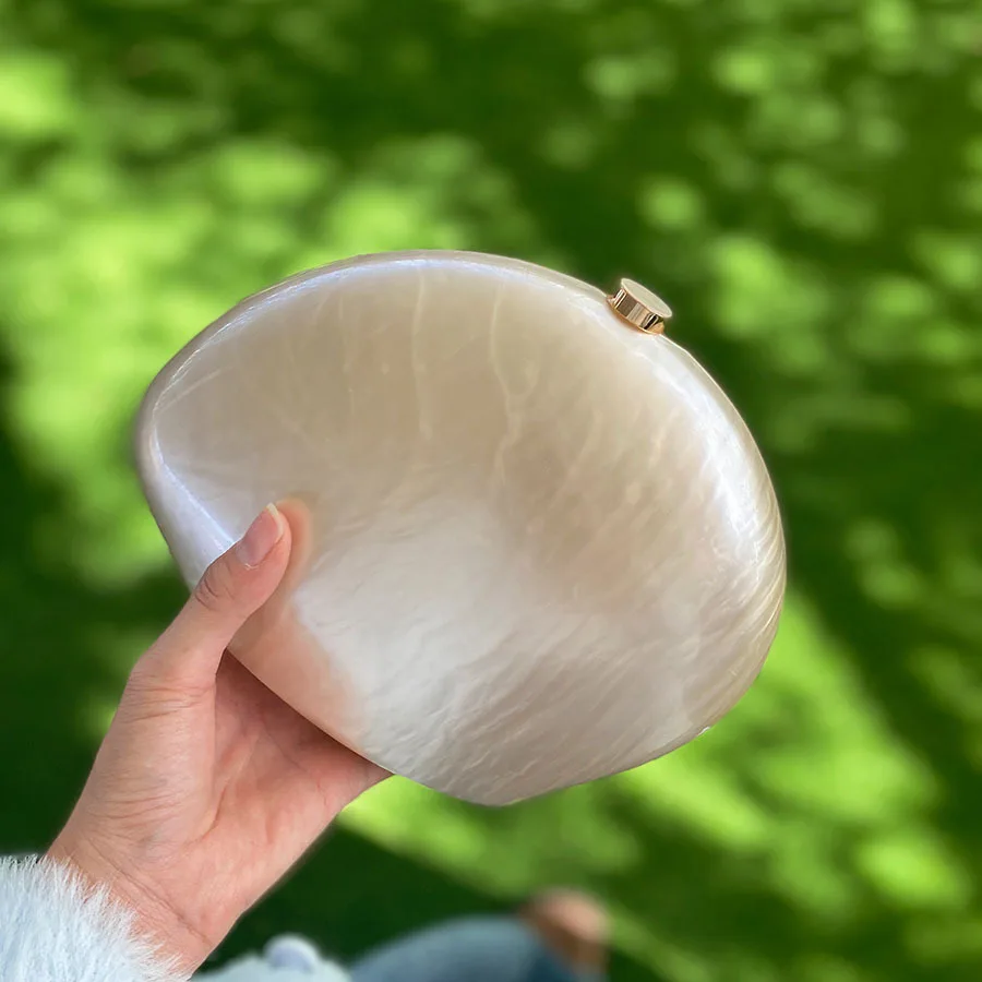 Acrylic bag shoulder fashion trend irregular goose egg chain hand box bag
Acrylic bag shoulder fashion trend irregular goose egg chain hand box bag