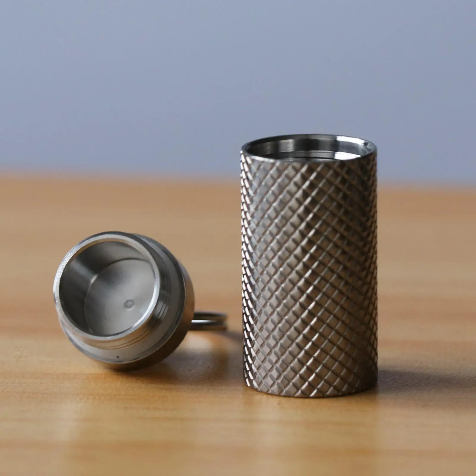 Compact Titanium Waterproof Capsule Keychain Pill Storage Case for Outdoor Survival Backpacking Emergency Use
Compact Titanium Waterproof Capsule Keychain Pill Storage Case for Outdoor Survival Backpacking Emergency Use