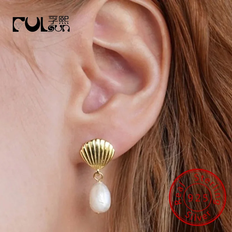 Wholesale Jewelry 925 Sterling Silver 14K Gold Plated Simple Shell Shaped Variant Bead Natural Freshwater Pearl Stud Earrings
Wholesale Jewelry 925 Sterling Silver 14K Gold Plated Simple Shell Shaped Variant Bead Natural Freshwater Pearl Stud Earrings