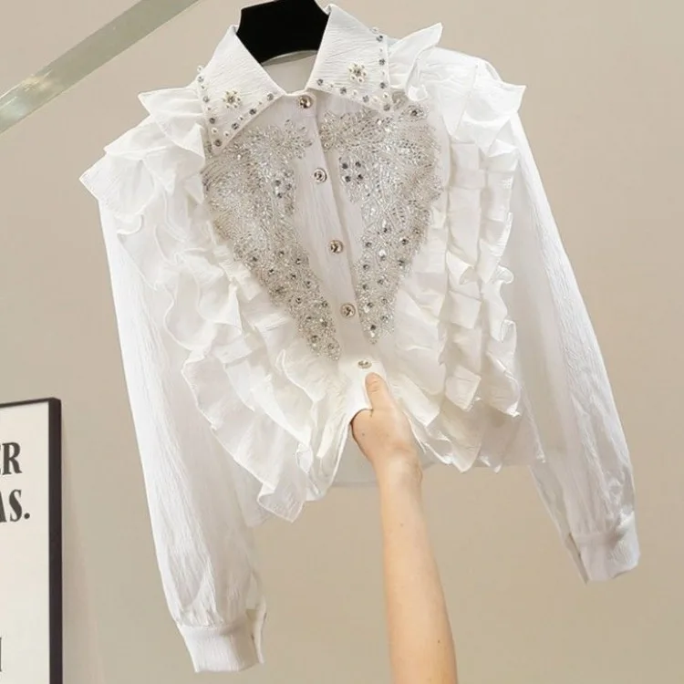 Elegant Heavy Diamond Lapel Neck Blouses Fashion All-match Ruffles Patchwork Blouses 2025 Spring New White Shirts Women
Elegant Heavy Diamond Lapel Neck Blouses Fashion All-match Ruffles Patchwork Blouses 2025 Spring New White Shirts Women