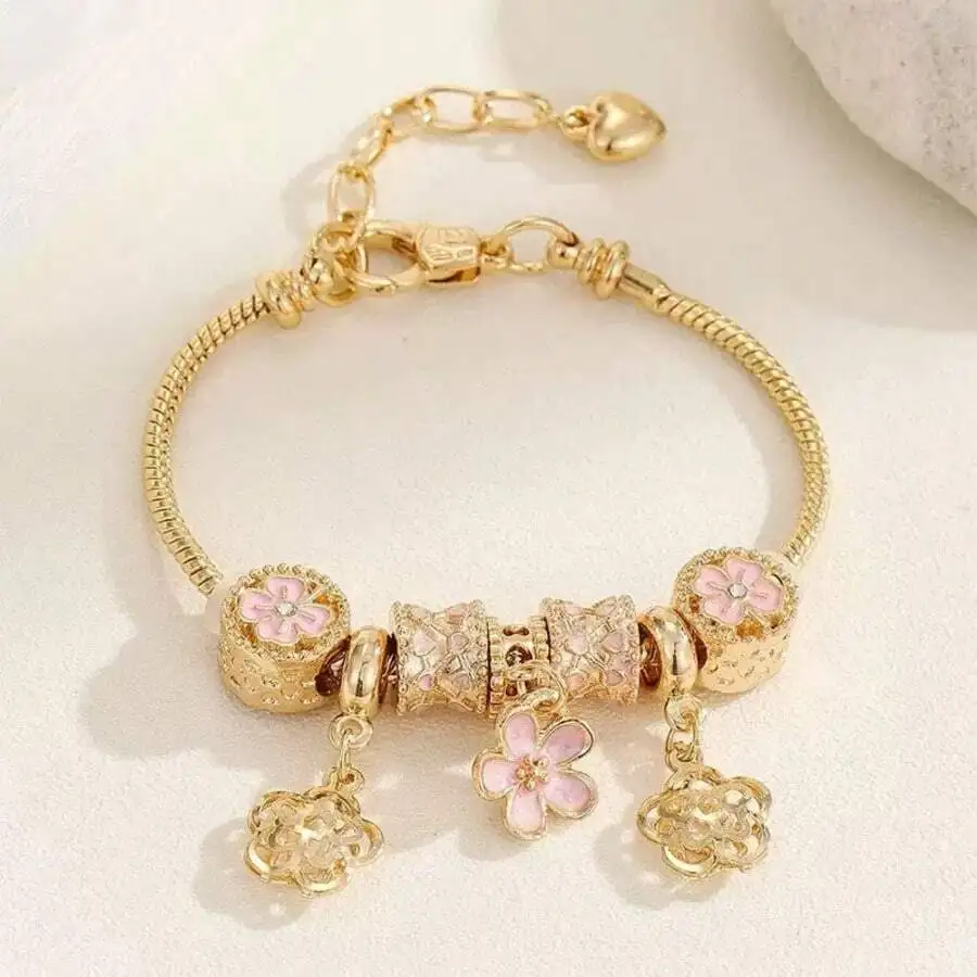 Gold Tone Floral Charm Bracelet With Pink Enamel Flowers For Women
Gold Tone Floral Charm Bracelet With Pink Enamel Flowers For Women